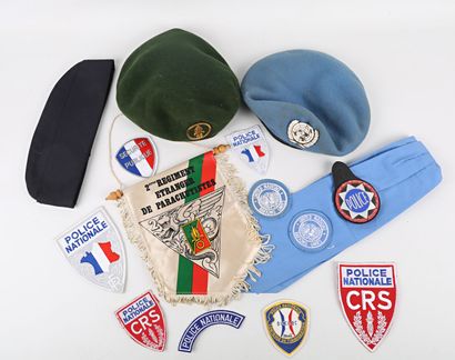 Blue beret of the UN, green beret of the...
