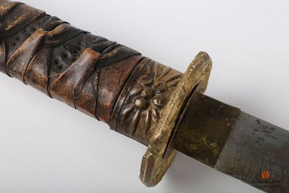 Katana, slightly curved sharpened blade of...