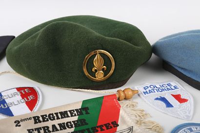 Blue beret of the UN, green beret of the...