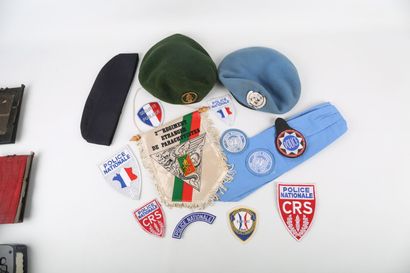 Blue beret of the UN, green beret of the...