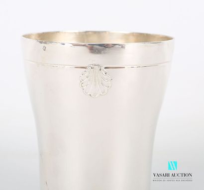 Silver tumbler of slightly moved form, posing...