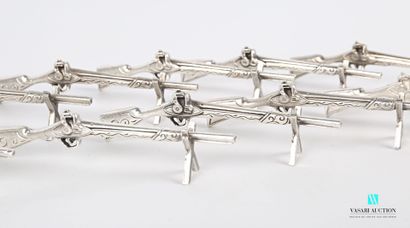 Suite of twelve knife holders in the shape...