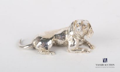 Silver subject representing a spaniel lying...
