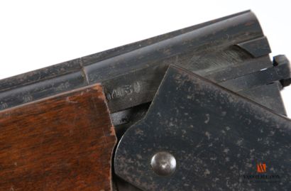 Lion Brand caliber 12-70 shotgun, superimposed...