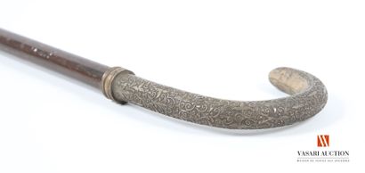Walking stick, curved handle in engraved...