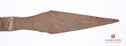 Carved metal point marked 
