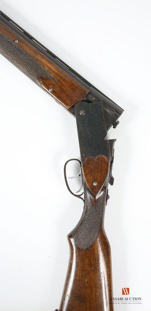 Lion Brand caliber 12-70 shotgun, superimposed...