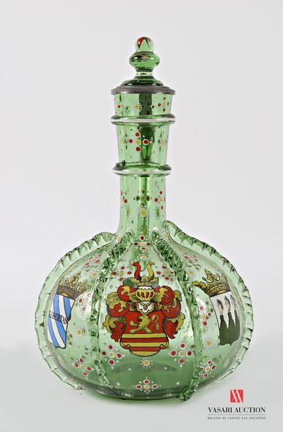 Bottle-shaped green blown glass decanter,...