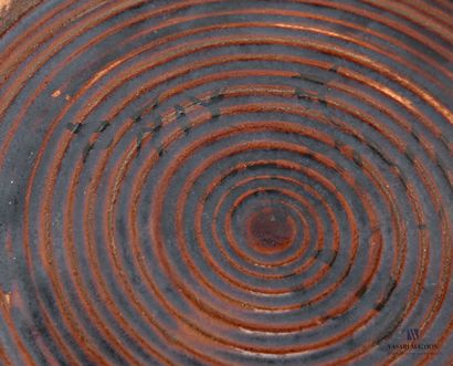 Glazed terracotta dish decorated with orange...