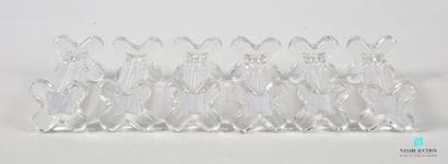 Suite of six molded glass knife-holders with...