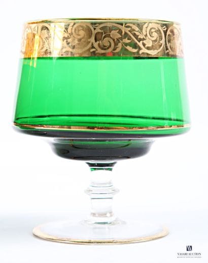 Suite of three colored glass bowls decorated...