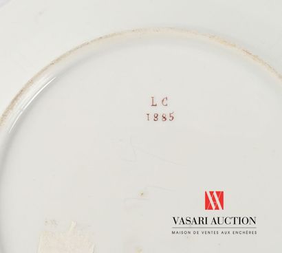 White porcelain dinner plate with polychrome...