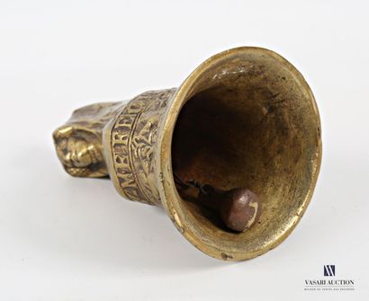 Bronze bell featuring a female bust, the...