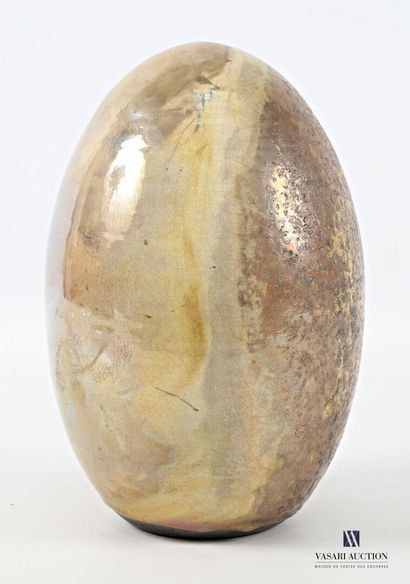 Glazed stoneware egg with gold-tone glaze,...