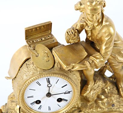 Gilded regule clock, with white enameled...