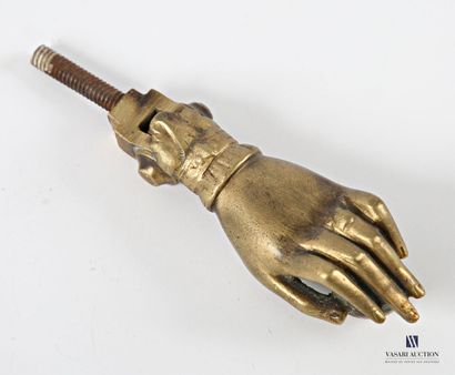 Gilt bronze door knocker featuring a hand...