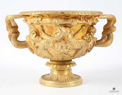 Gilt bronze bowl standing on a pedestal base...