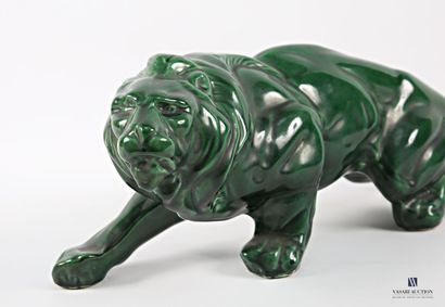 Green patinated ceramic subject featuring...