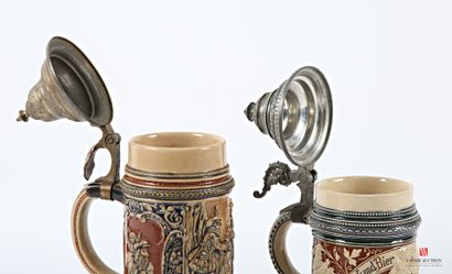 Two polychrome earthenware covered mugs,...