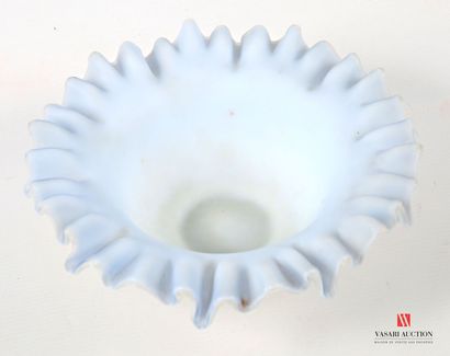 Round-shaped bowl in partially blue-tinted...