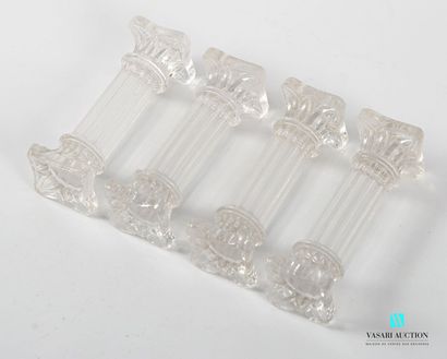 Suite of four glass knife-holders, the supports...
