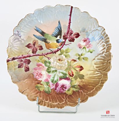 Round and hollow porcelain dish with polychrome...