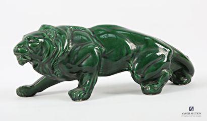 Green patinated ceramic subject featuring...