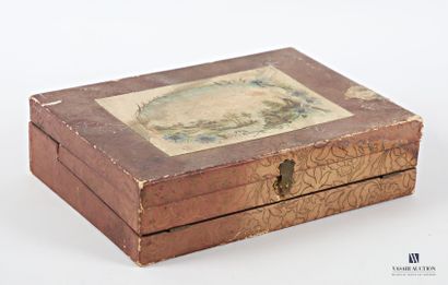 Dark wood box with paper embossed with flower...