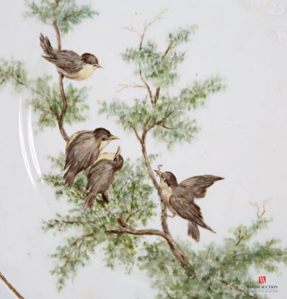 White porcelain dinner plate with polychrome...