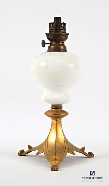 A kerosene lamp, the white opaline glass...