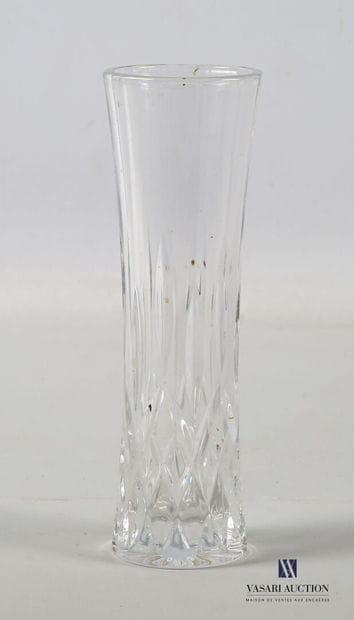 A tubular glass vase, slightly narrowed in...