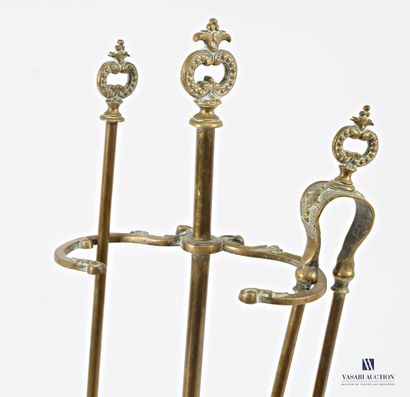 Bronze mantelpiece set, the shaft surmounted...