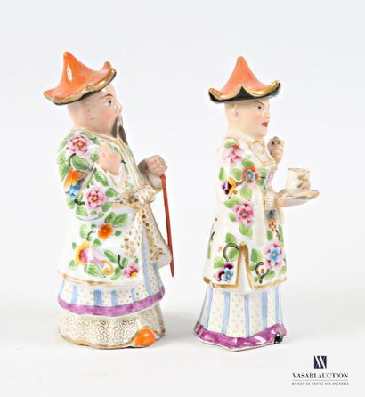 Asian porcelain couple adorned with flower-decorated...