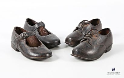 Set of two pairs of cast-iron shoes. 
(scratches,...