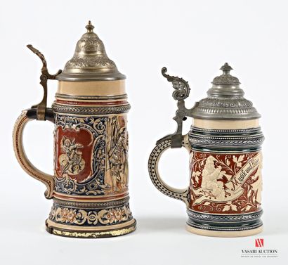 Two polychrome earthenware covered mugs,...