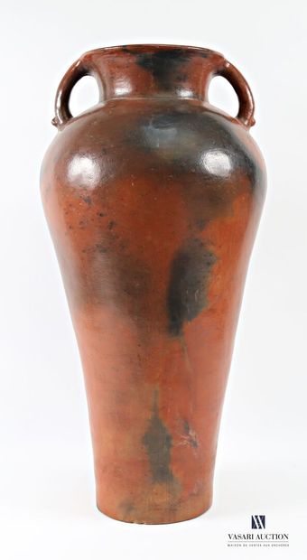 A truncated cone-shaped amphora in patinated...