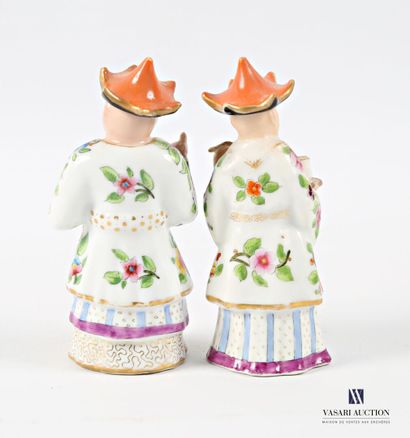 Asian porcelain couple adorned with flower-decorated...