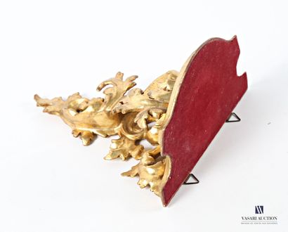 Carved and gilded wood wall lamp decorated...