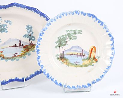 Two plates and an oval dish in enameled earthenware,...