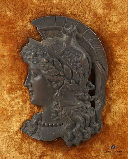 Regula plate with brown patina depicting...