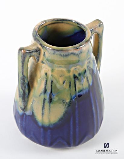 An ovoid stoneware vase with handles, decorated...