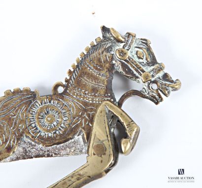 Engraved bronze betel nut cracker featuring...