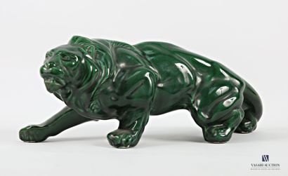 Green patinated ceramic subject featuring...