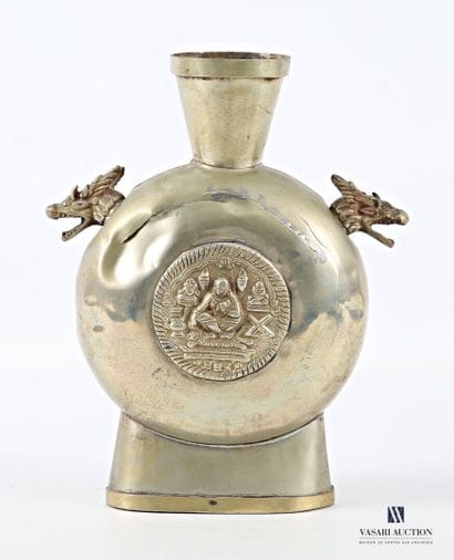 A gilded brass gourd-shaped vase decorated...