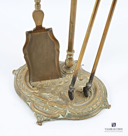 Bronze mantelpiece set, the shaft surmounted...