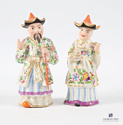 Asian porcelain couple adorned with flower-decorated...