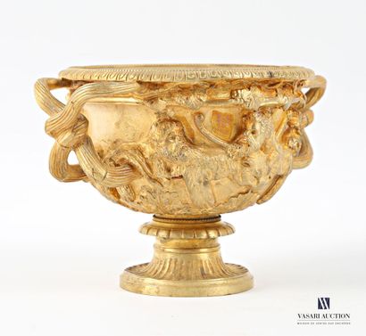 Gilt bronze bowl standing on a pedestal base...
