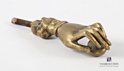Gilt bronze door knocker featuring a hand...