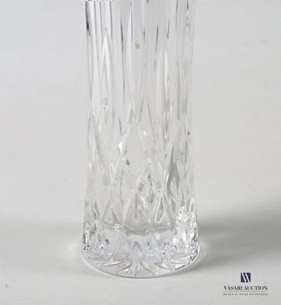 A tubular glass vase, slightly narrowed in...