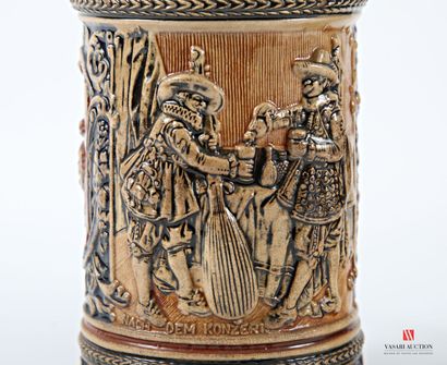 Two polychrome earthenware covered mugs,...